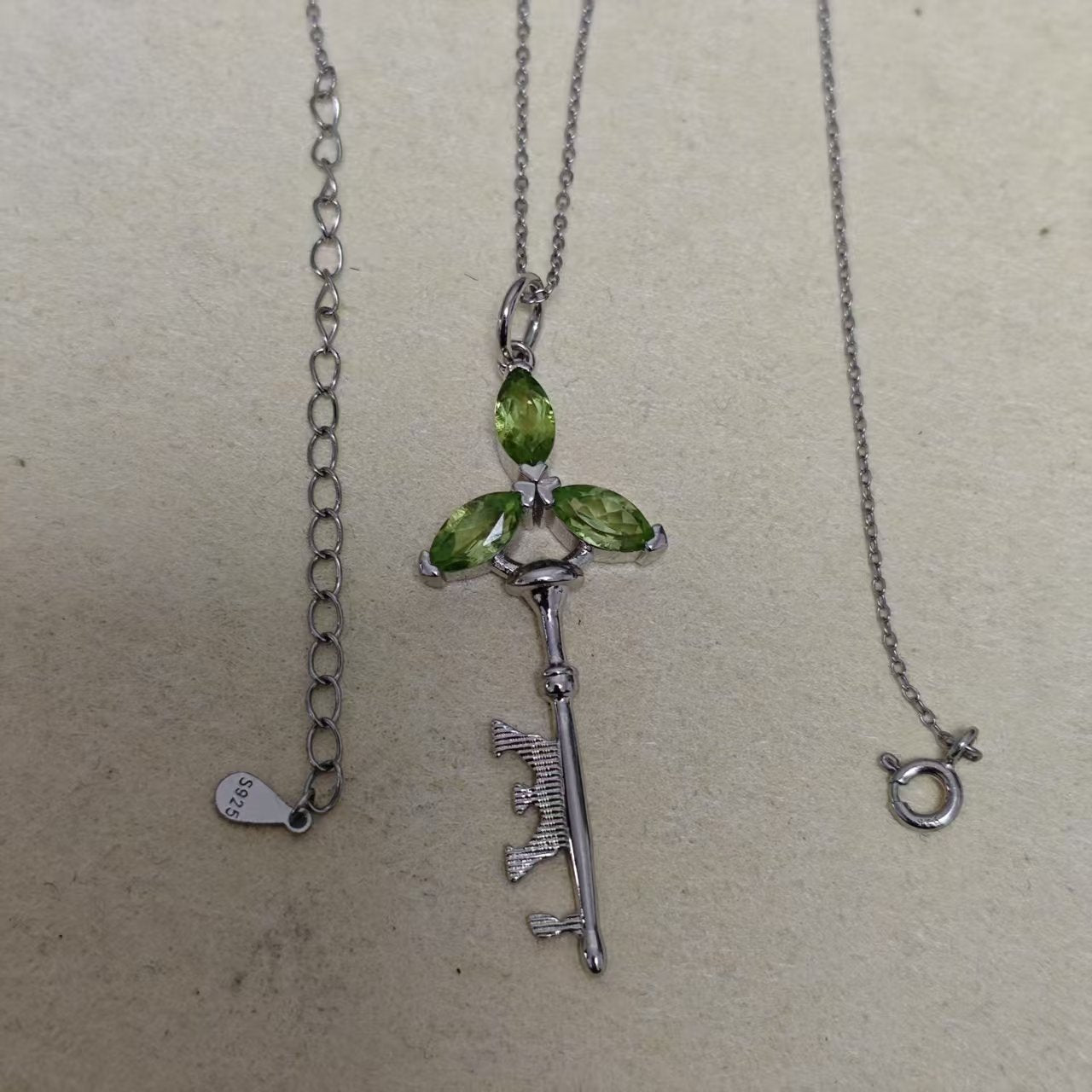 Nature Mama – Triple Goddess Peridot Silver Key Pendant
