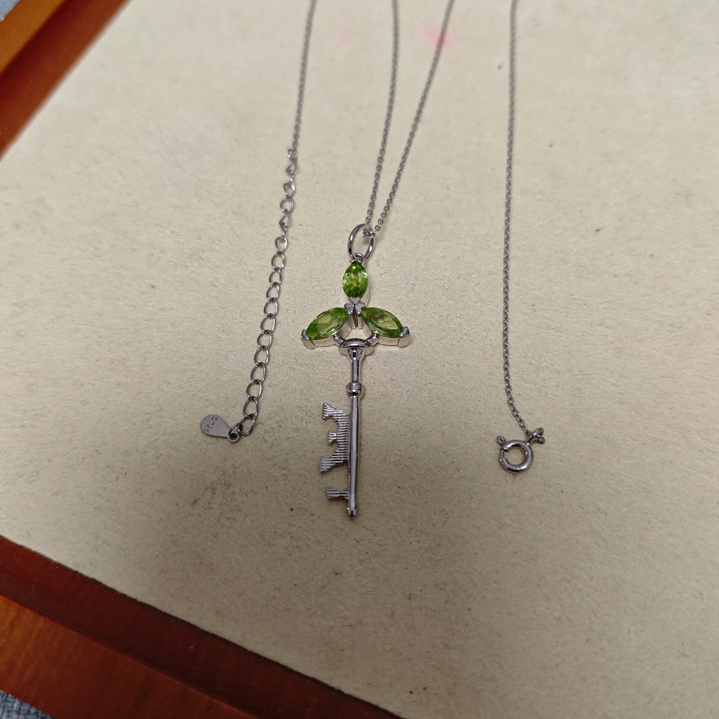 Nature Mama – Triple Goddess Peridot Silver Key Pendant