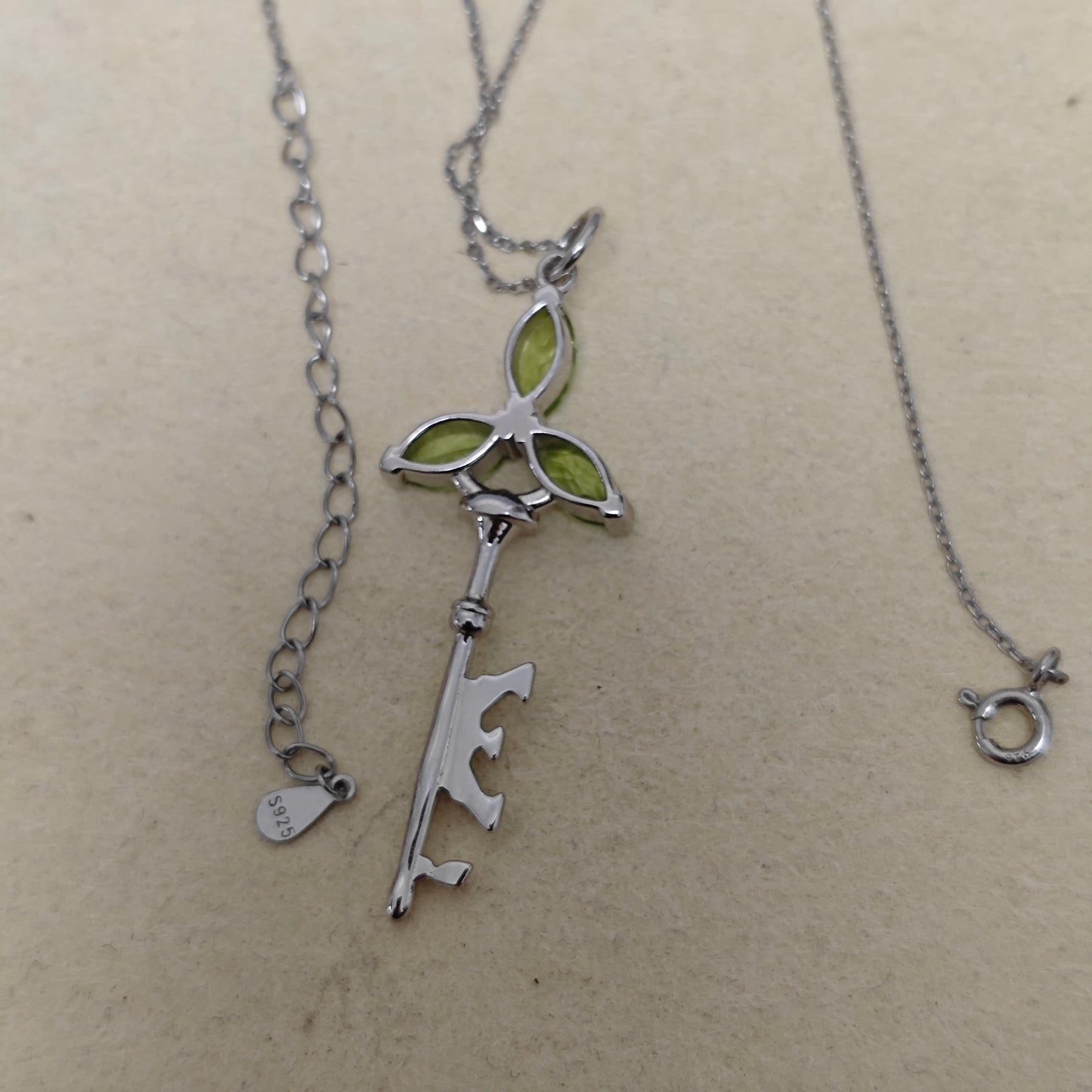 Nature Mama – Triple Goddess Peridot Silver Key Pendant